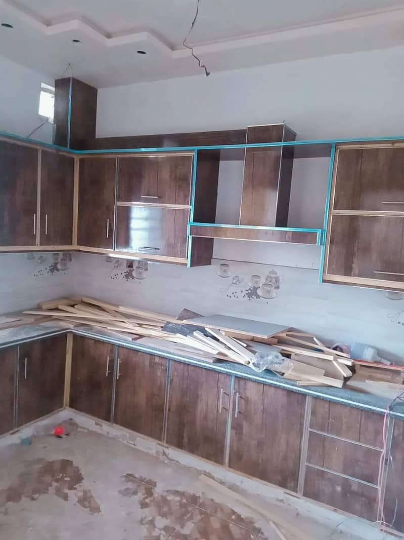 wood works,kitchen cabinets,Wardrobes,Carpenter,Cupboard,almari 10