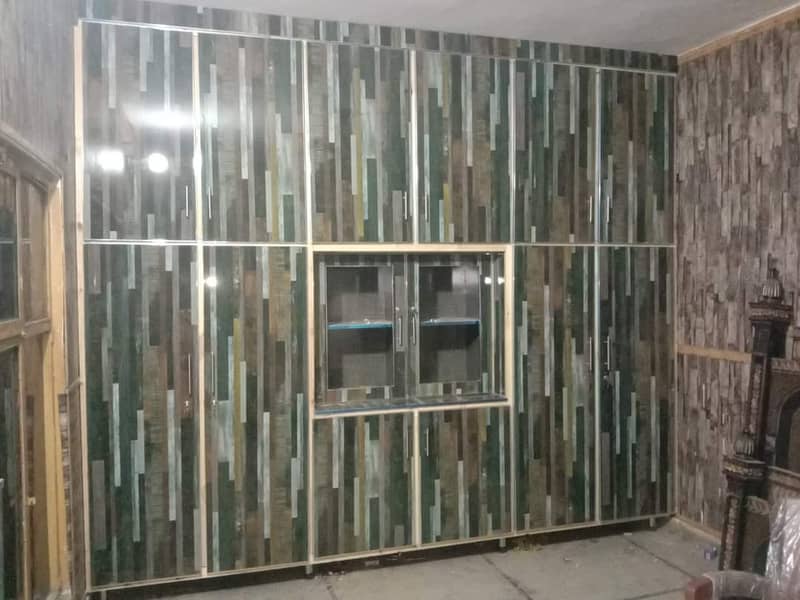 media wall,wood work,cabinets,Wardrobes,Carpenter work,wooden doors 1