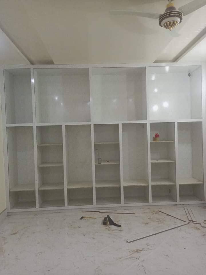 media wall,wood work,cabinets,Wardrobes,Carpenter work,wooden doors 5