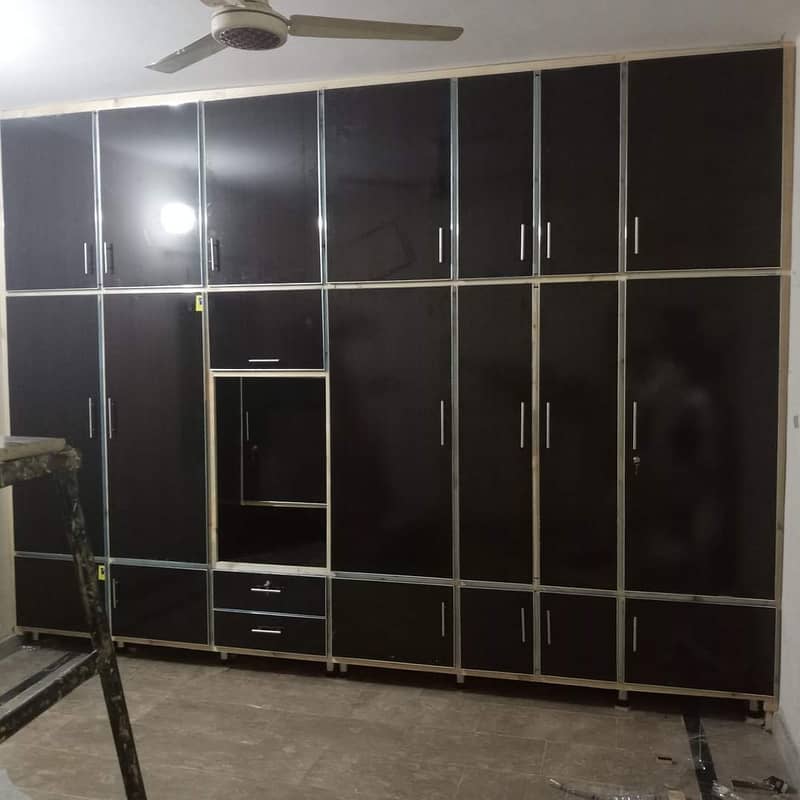 media wall,wood work,cabinets,Wardrobes,Carpenter work,wooden doors 6