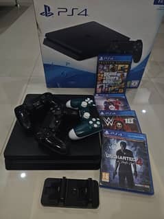 PS4 Slim 1TB –SSD, 3 Controllers, 4 Physical Games 0