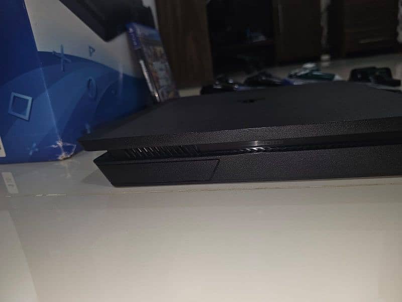 PS4 Slim 1TB –SSD, 3 Controllers, 4 Physical Games 3