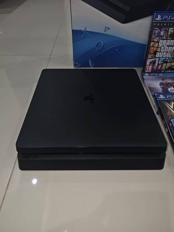 PS4 Slim 1TB –SSD, 3 Controllers, 4 Physical Games 5