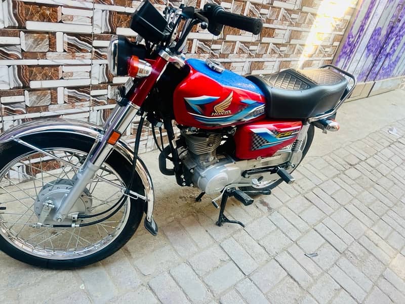 Honda 125 Total Genion 7