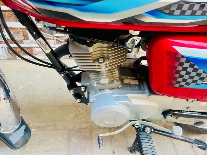 Honda 125 Total Genion 8