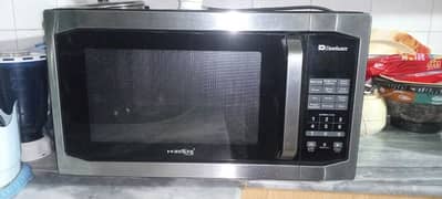 Dawlance Microwave Oven with Grill - 24L Capacity, 1100W Power 0