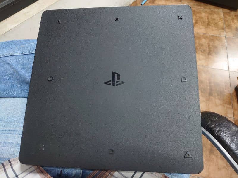 PlayStation 4 slim 1Tb Sealed with 2 controller 8 Games preinstalled 1