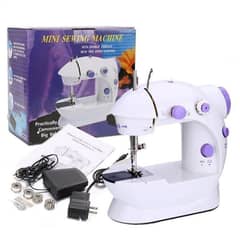 Mini Sewing Machine 0