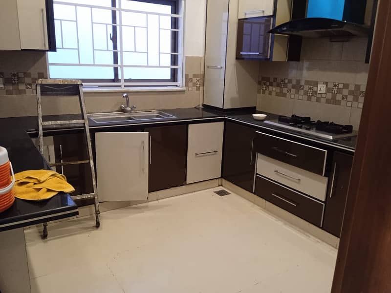 10marla 3beds DD TV lounge kitchen attached baths Brand New ground portion for rent in G 13 4 islamabad 5