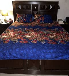 Bed set with a matching cupboard.