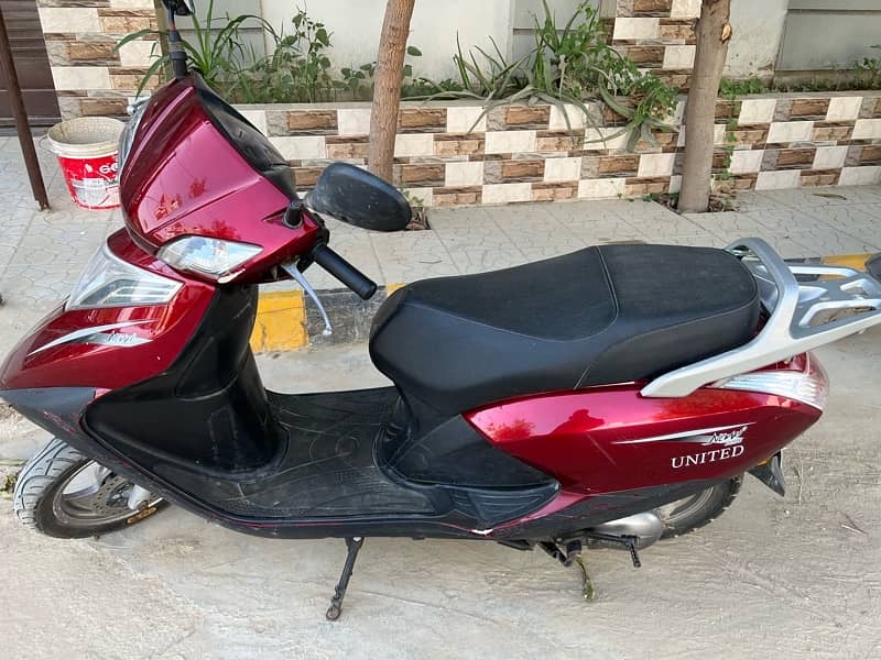 United scooty 100cc 1