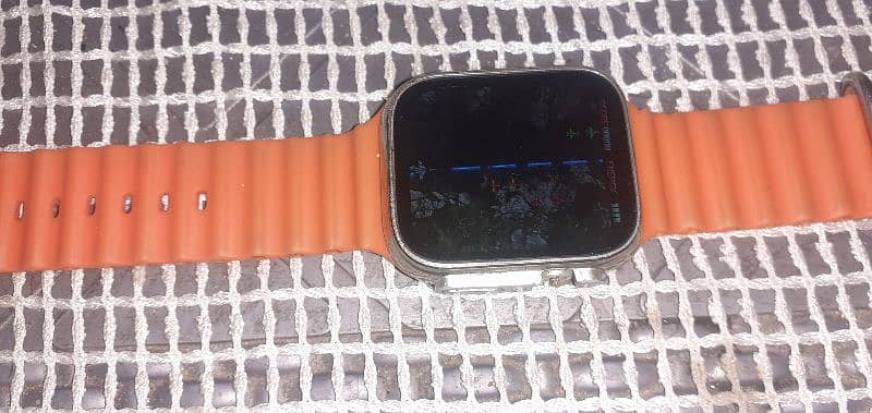 this smart watch have calculator game 1.99 inch display  orange strap 1