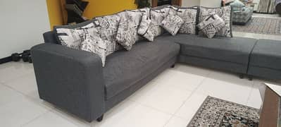 L shaped 7 seater in good condition withcushions