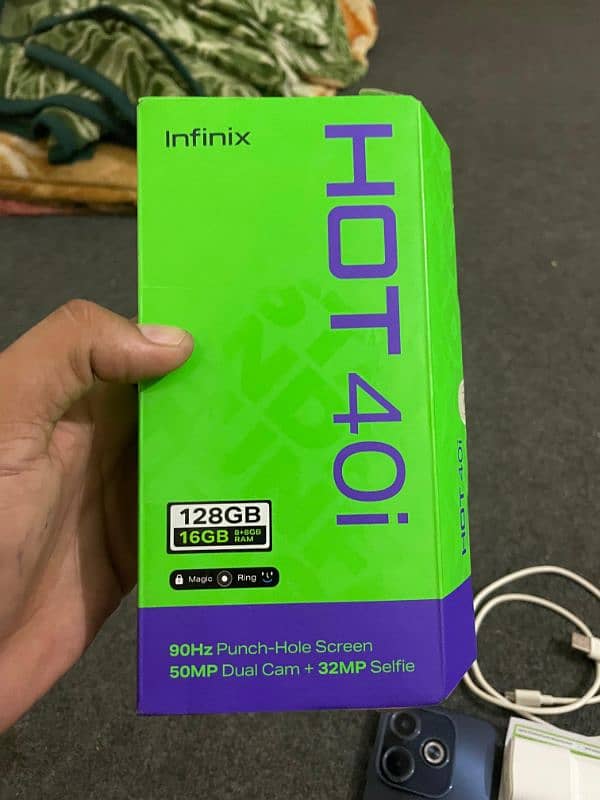 infinix hot 40i  brand new with box and charager PTA Approved 4