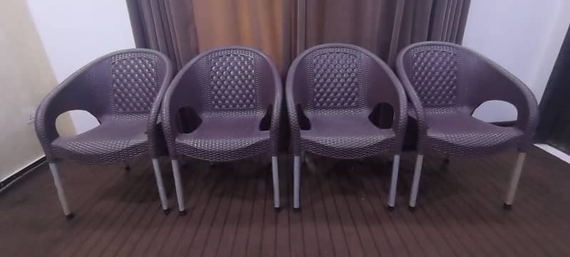 4 Plastic Chairs - New Condition 1