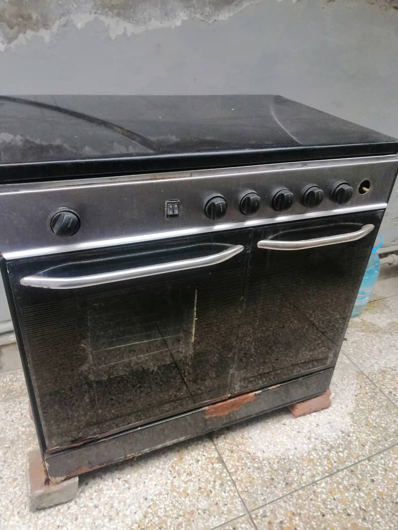 Cooking Range & Rocking Chair For Sale 1