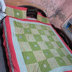 double bed with mattress and dressing