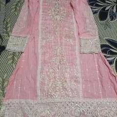 1. pink embroidered shirt 2. . . light sea green frock