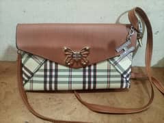 brown color beautiful bags. dress price 2000