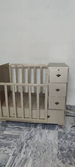 Baby cot with storage