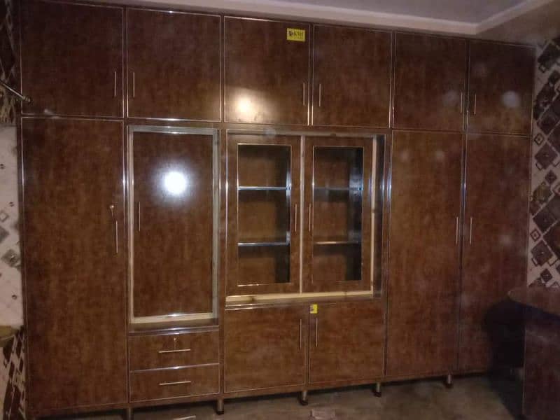 Carpenters works,Wardrobe,wooden cabinets,media wall,doors,wood work, 10