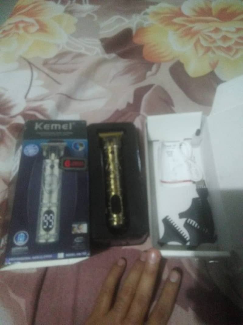 Kemei professional hair clipper adjustable blade clipper 1