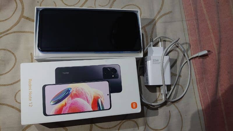 I'm selling my phone redmi note 12 with all accessories 3