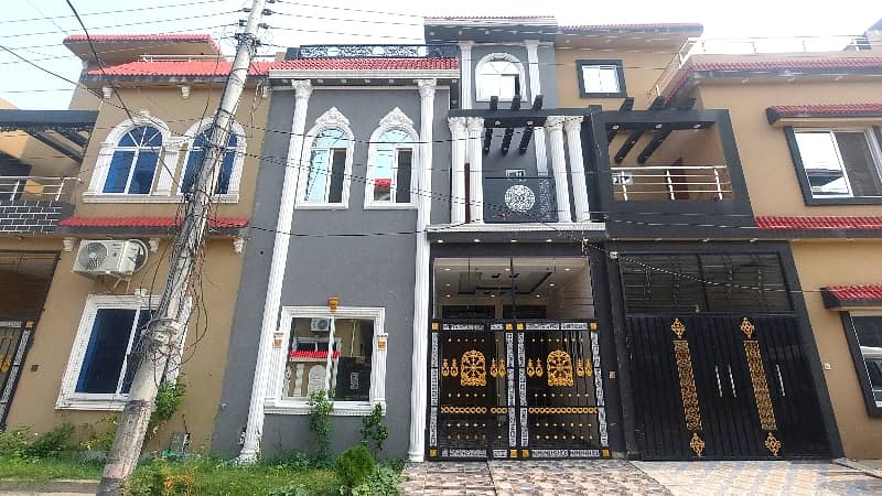 Prominently-Located House Available In Al-Ahmad Garden Housing Scheme For sale 0