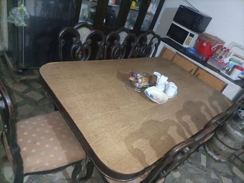 Dining table with 8 chairs seats 1