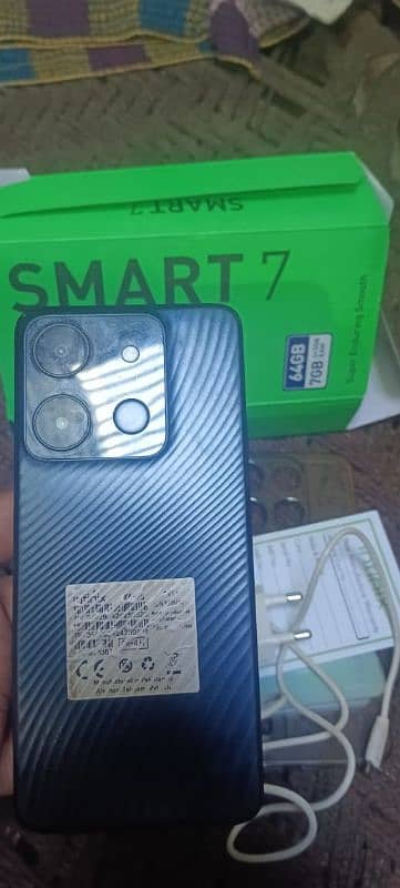 infinix smart 7 with box and charger 1