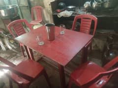 1 tables, 4 chair , 1jug  and 2 glass