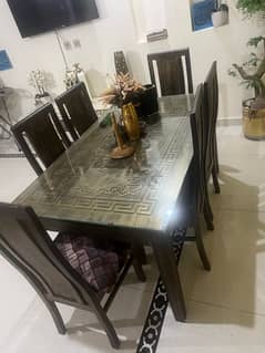 dining table with 6 chairs and glass