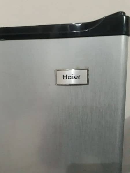 Haier Silver room fridge with freezer 1