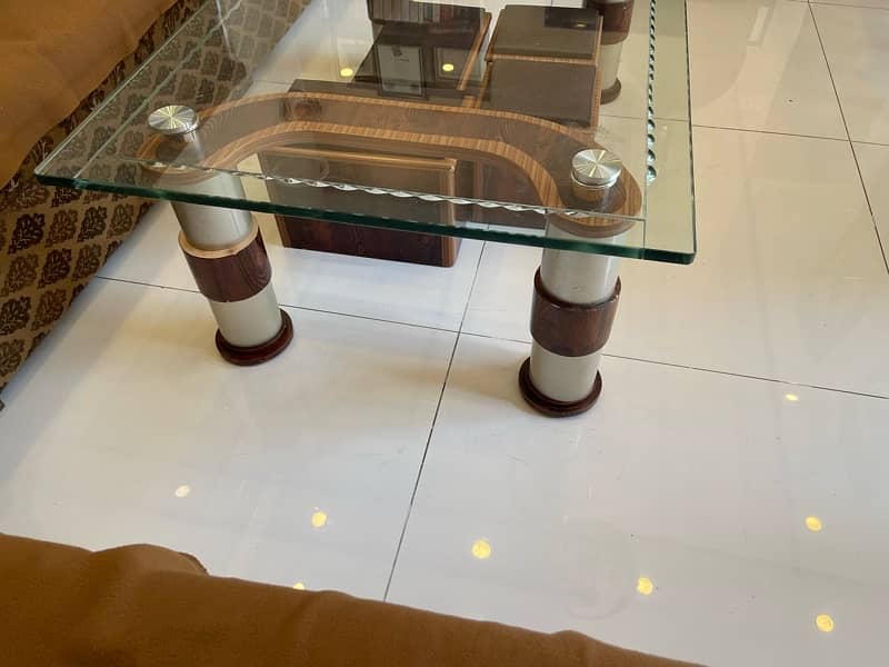 Beautiful wood + glass centre table. 2