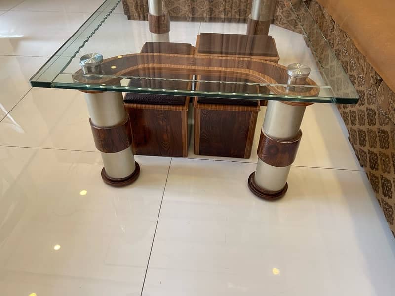 Beautiful wood + glass centre table. 3