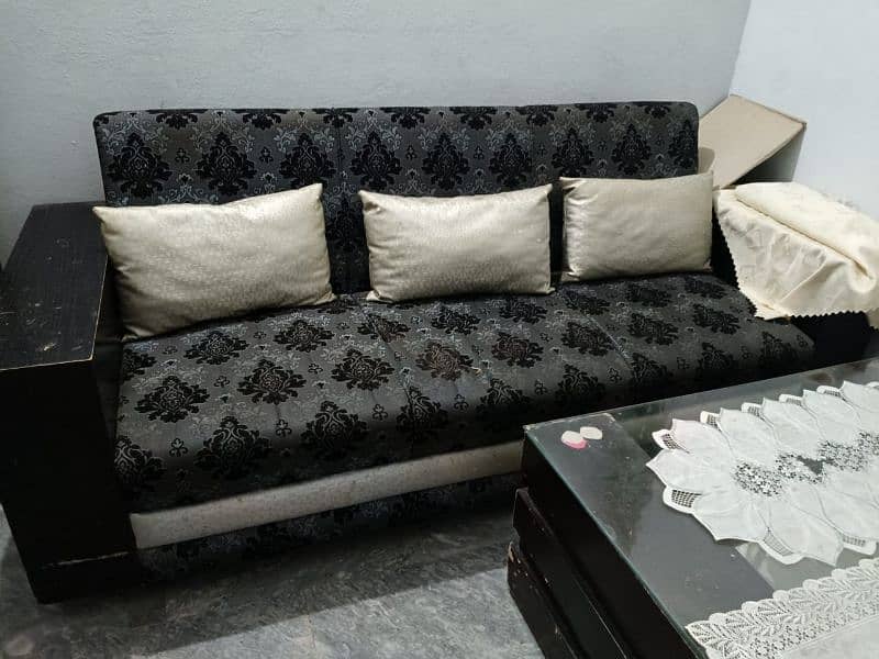 sofa cum bed with Sofa set and Glass table 2