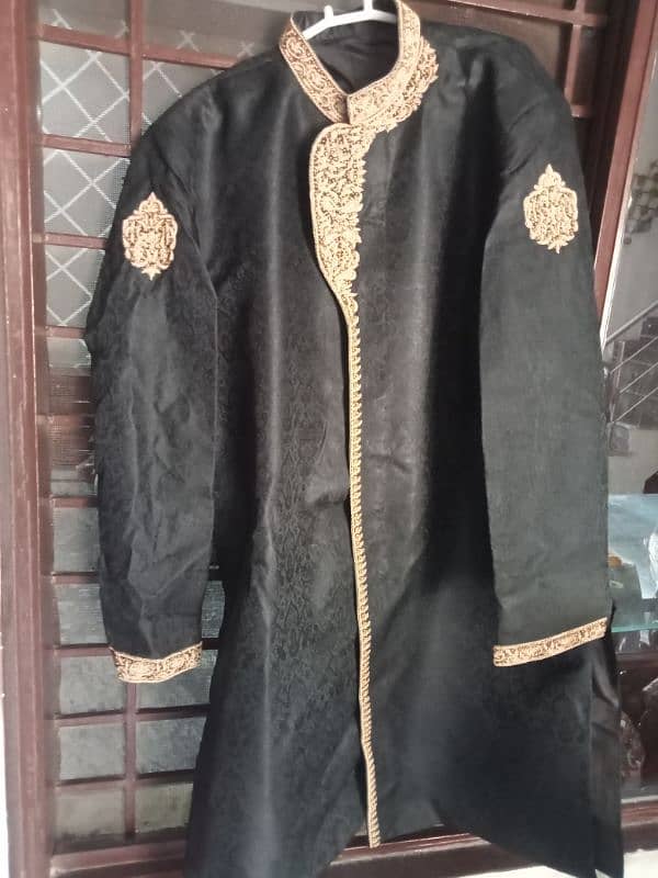 Sherwani color black with gold clr embroidery 3