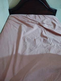 wooden single bed without mattress