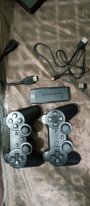 Wireless controller gamestick with 20000 plus games urgent sale 1