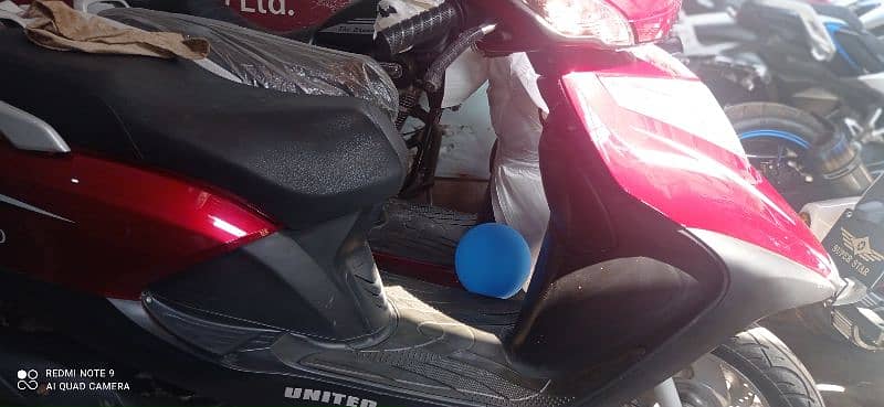 United scooty 100cc 1