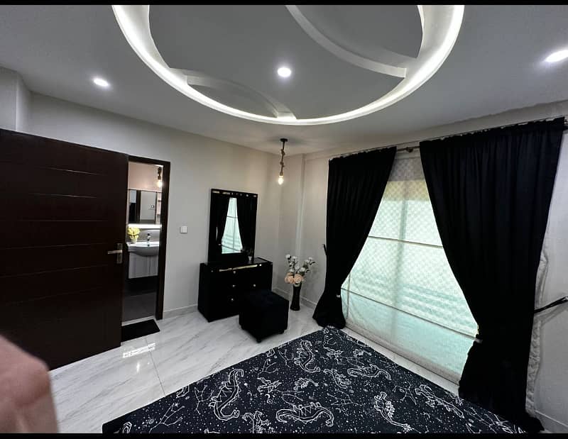 1 Bedroom VIP Full furnish flat per day available in Bahria town Lahore 11