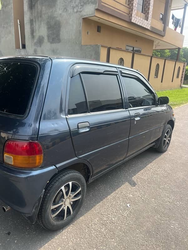 Daihatsu Cuore 2005 total genioun paint 5