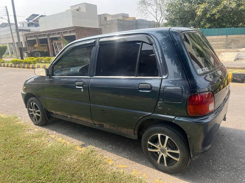 Daihatsu Cuore 2005 total genioun paint 7