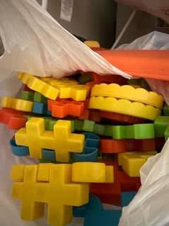 2 pack of blocks. 4 stuff toys. 2 cars large sized. 4 wooden puzzle. 0