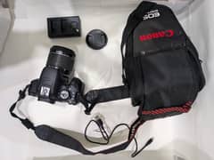 Canon EOS 700D Camera - 18-55mm Lens, Auto Focus, with battery charger