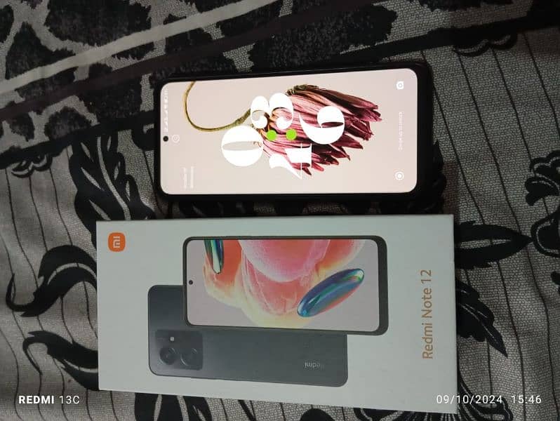 Mi redmi note 12 brand new condition. scratchless 1