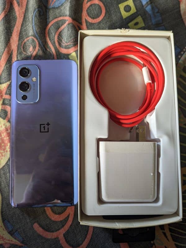 OnePlus 9 approved 8/128gb with 65watt warp charger 2