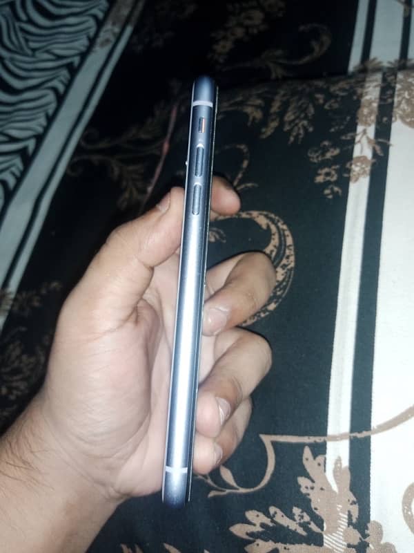 IPhone 11 with charger 3