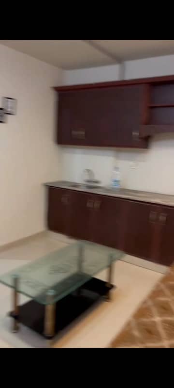 1BED FULLY FURNISHED APORTMENT IS AVAILABLE FOR SALE IN SECTOR C BAHRIA TOWN LAHORE 2