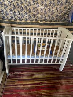 Child cot with mattress and music box mobile